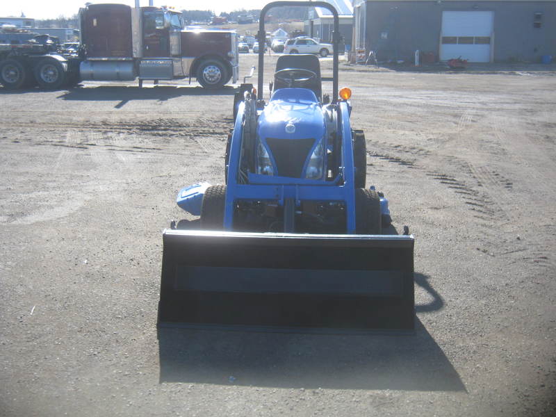 Tractors - Compact  New Holland T1030 Tractor  Photo